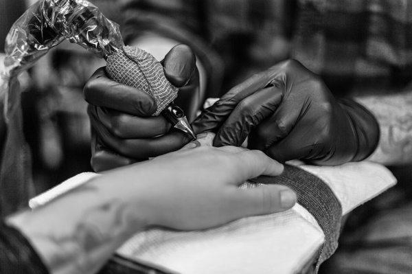 Kerry Brown tattooing