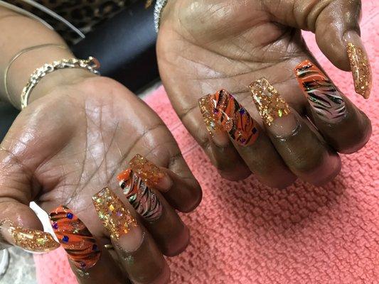 Gel glitters tips with nail arts