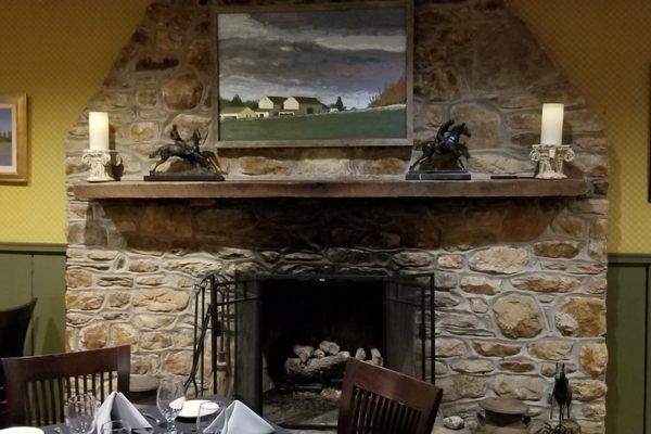 West dining room with fireplace