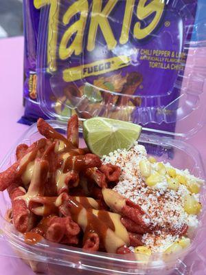 One of our more popular snacks, Taki-esquite! Takis topped with nacho cheese and salsa Valentina, served with an esquite-street corn