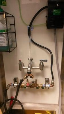 Commercial Backflow Preventer in a mop closet