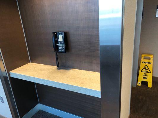 Phone by restrooms