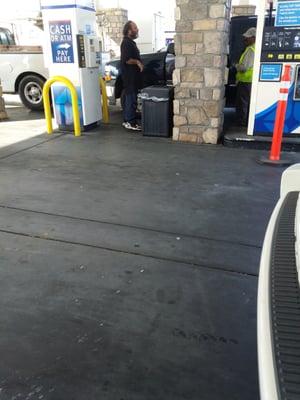 Watch out for loitering at this ghetto gas station. First and last time I pump here and women should avoid this station too!