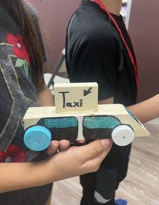 Making cars during wood working classes!