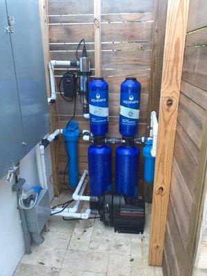 New whole house water filter system and pressure booster pump installation.