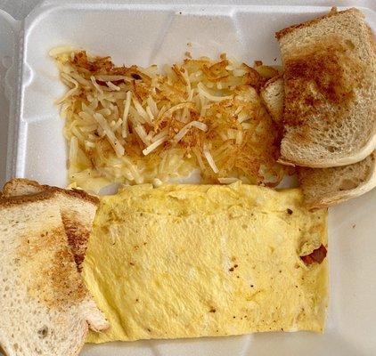 Awesome 3 egg omelette, shredded hash browns and toast!