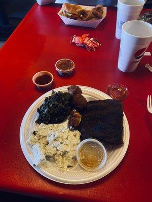 My lunch: dry ribs, cold collards and potato-spackle