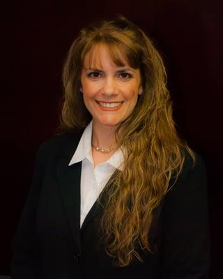 Erika Lamb, Broker