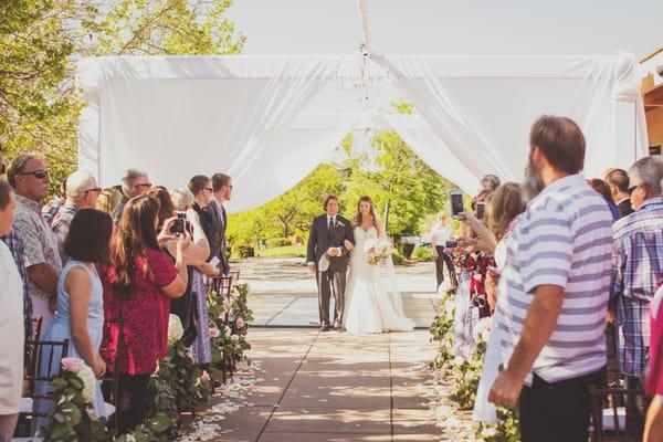 The structure made the whole wedding more beautiful, and also gave me a way to make a grand entrance as my dad walked me down the aisle.