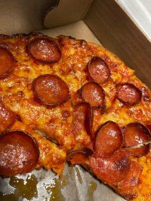 pepperoni pizza made "crispy"