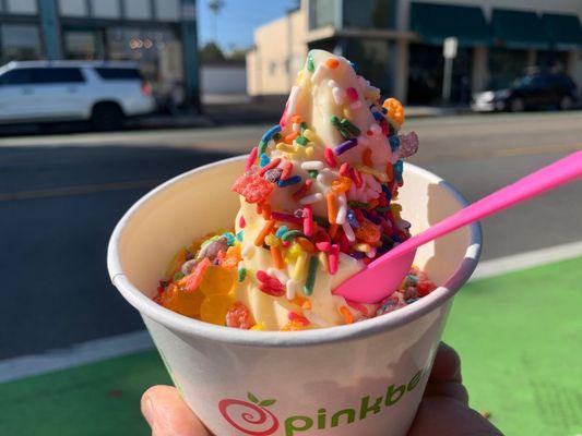 Mango with fruity pebbles and sprinkles