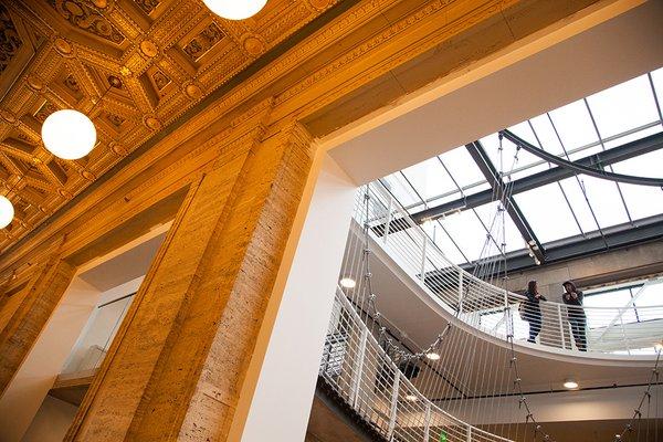 A look inside the main campus at 511 NW Broadway. The historic hallway and the light-filled atrium.