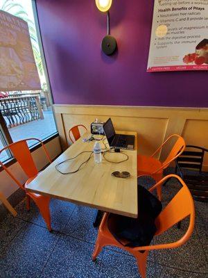 Table with electric outlet & USB chargers