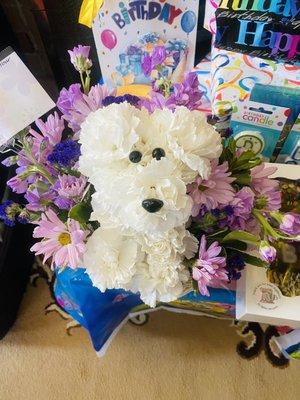 Marina Did an Awesome job!!! On this Flower arrangement! Absolutely Beautiful!! My daughter loved the puppy and so did I. Great Job!