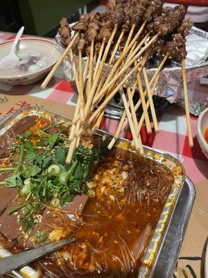 Skewers -- comes in beef, lamb, and pork The aluminum plate has duck blood with glass noodles