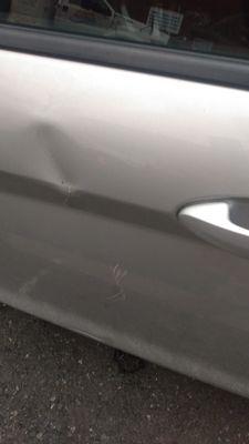 Dent and new scratches suddenly on my car.