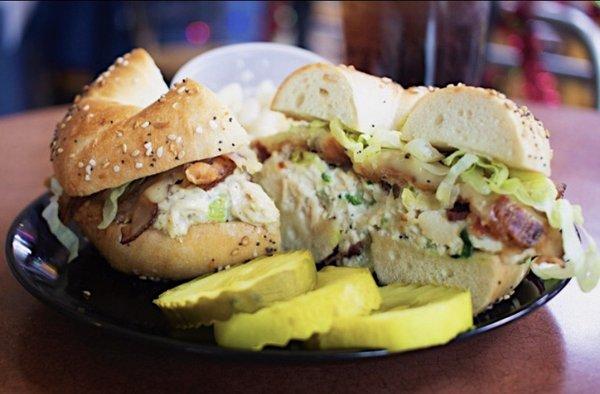 Chicken Salad Supreme (Chicken Salad, Lettuce, Tomato, Crispy Bacon, Melted Swiss, on a Fresh Bagel) (served with side salad and pickles)