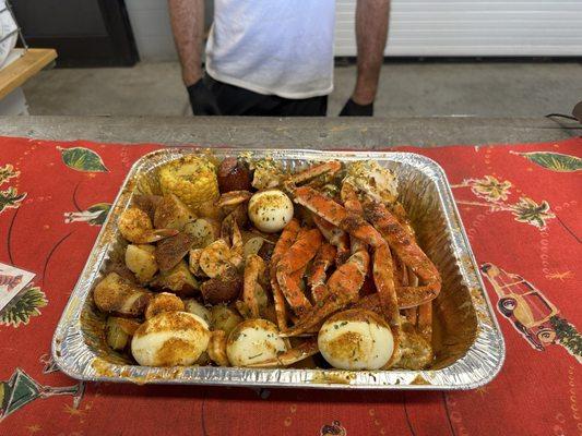 Snowcrab legs, eggs, potatoes, and shrimp. Seasoned in cajun mermaid.