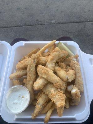 Isca de Peixe served with tartar sauce.