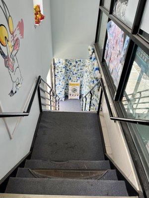 cafe is located up these stairs!