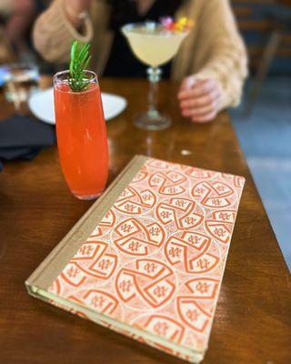 My Floral Spritz mocktail and the cute book menu!