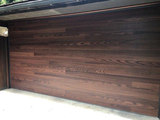 Dark oak planks steel door.