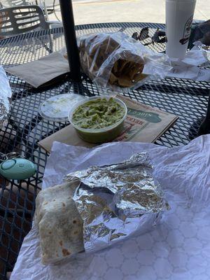 Carne Asada Burrito w/ Beans plus cheese and rice and their 8oz guacamole and medium chip bag