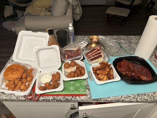 Texas Burger, Jalapeno Poppers, Broccoli Bites, Half Rack Ribs , red velvet cake.