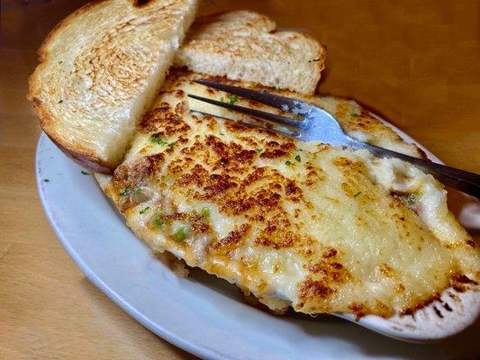 Shepherds pie served HOT and tasty with creamy mashed potatoes.