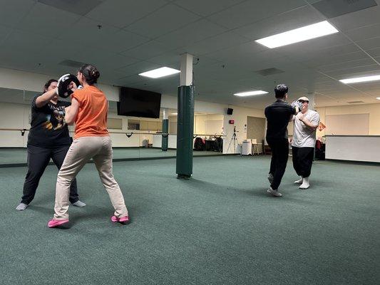 More punching drills for Wing Chun. Teaching the students how to move. #Wing Chun  pad work #fight application