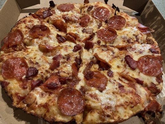 Pepperoni and bacon pan pizza.