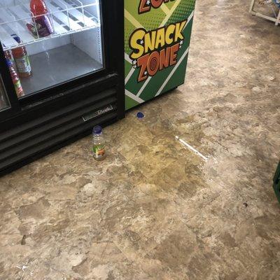 Nasty sticky spilled drink on the floor