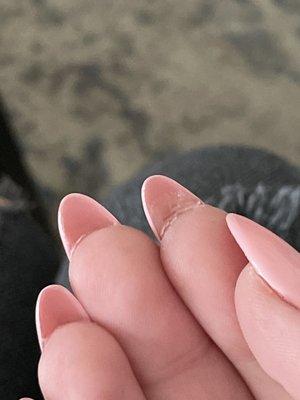 A chunk of glue under my nail. SO UNCOMFORTABLE and so GROSS!