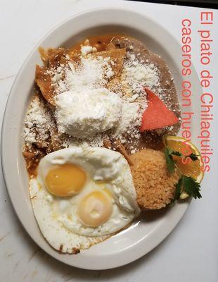 Breakfast chilaquiles plate with queso cotija. Along with 2 eggs