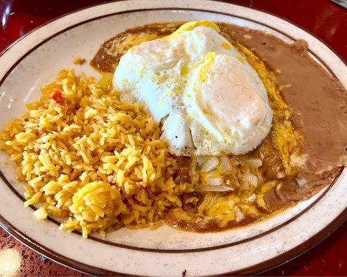 Texas Plate, 2 ground beef enchiladas, 2 eggs, rice and beans. I liked chopped onions on top of the enchiladas. So tasty!!