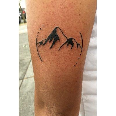 Very clean PNW mountain tattoo