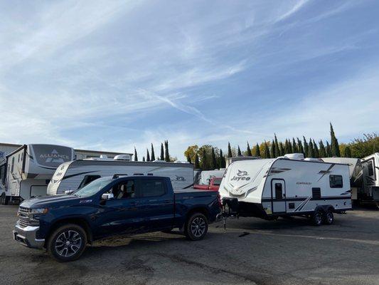 Our Jayco Jay Feather X213 (Buttercup... still trying out the name to see if it sticks) and Leonidas (our trusty Chevy).