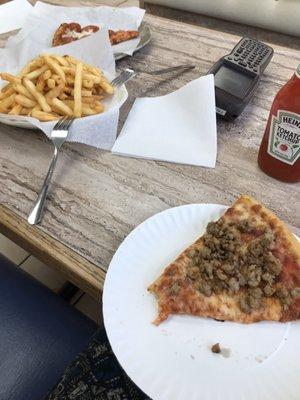 Sausage pizza. French Fries.