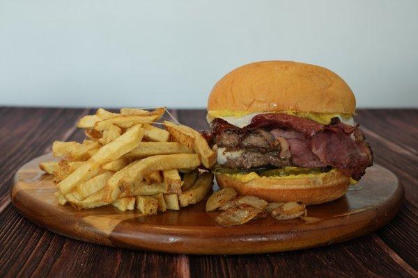 1/2 Pound Ribeye Burger, Spicy Brown Mustard, Pastrami, Mozzarella Cheese, Grilled Onions, & Pickles on a Fresh Baked Bun.