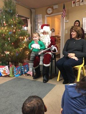 Santa comes every year to give the children a book their parent(s) brought in wrapped ahead of time.Vicki and Lorraine also do an Angel tree