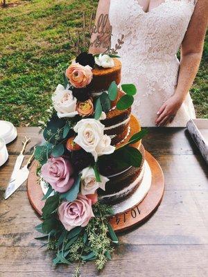 Our "naked" wedding cake. Bottom to top tiers: chocolate, key lime, carrot cake, vanilla.