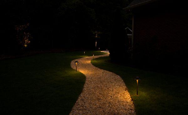 Outdoor lighting with pathlights and uplights adds safety and security