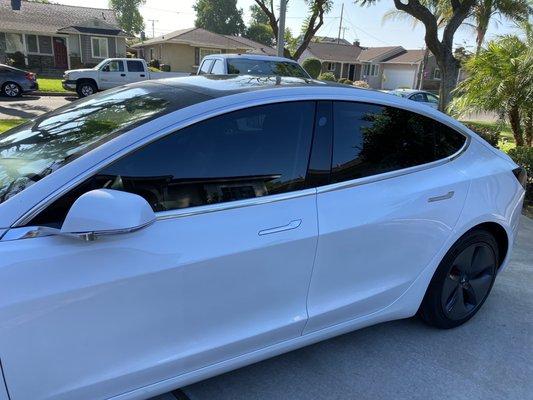 We got the side windows on our Tesla Model 3 tinted.