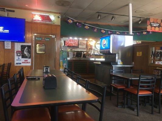 Front counter, dining area and beverage station.