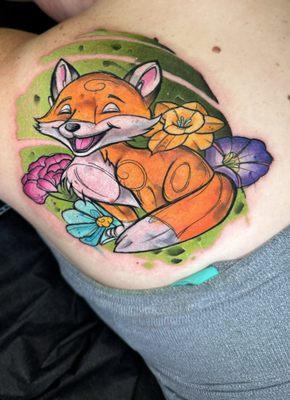 Vibrant Watercolor fox tattoo by Jon Leighton, owner of Fallen Crow Tattoo