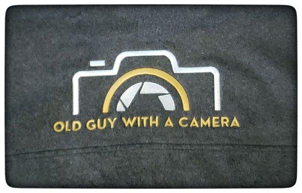 Design for 'old guy with a camera'.