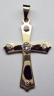 14K yellow and white gold cross.