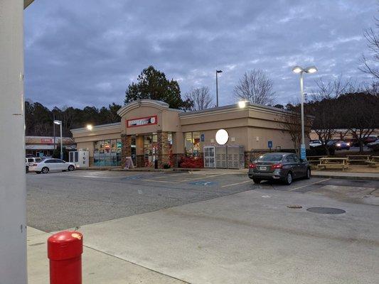 Outside the Food Mart convenience store.