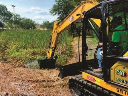 Dredging a stormwater pond.