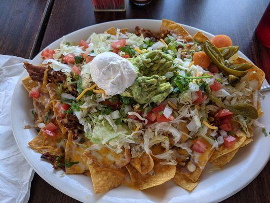 Super Nachos with shredded beef.